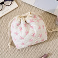 Bow Patterned Quilted Drawstring Cosmetic Bag
