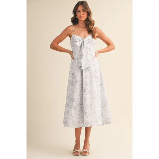 A Floral Printed Midi Dress With Front Tied Ribbon